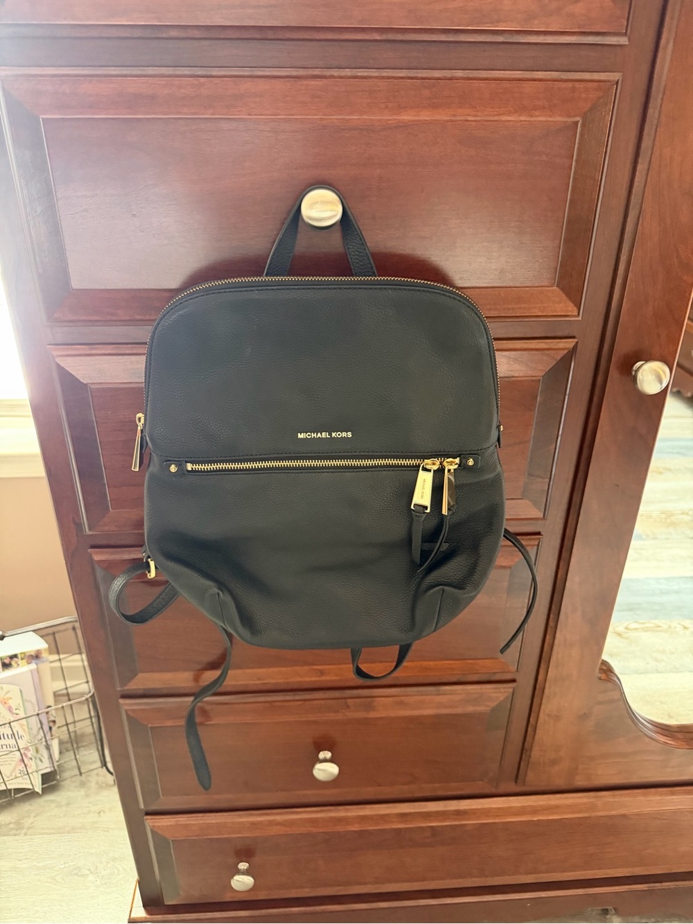 Michael Kors Black Leather Backpack with Gold-Tone Accents